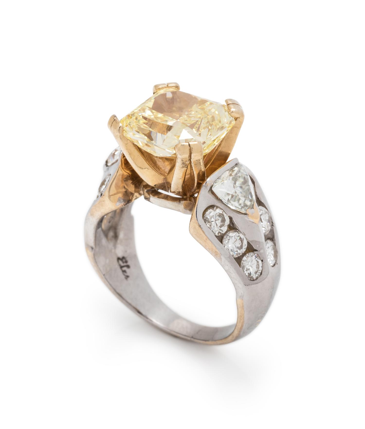 FANCY YELLOW DIAMOND AND DIAMOND RING