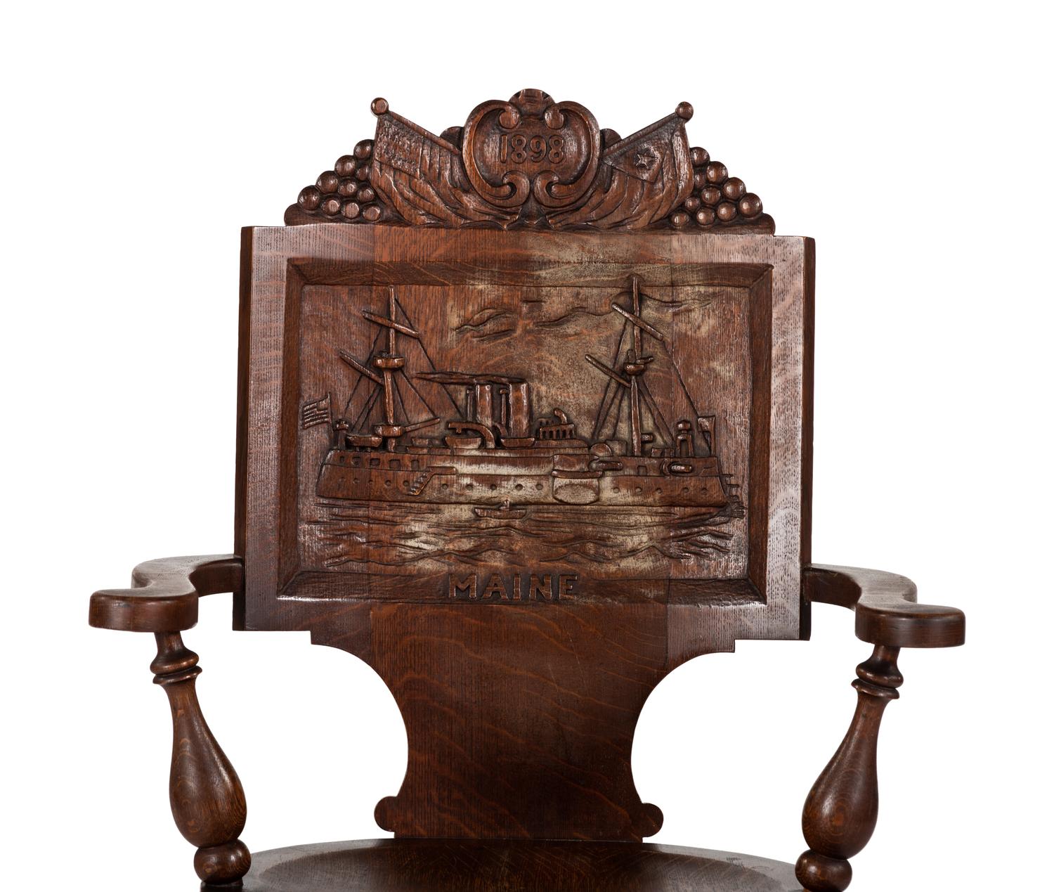 A Folk Art Pressed Oak USS Maine Chair