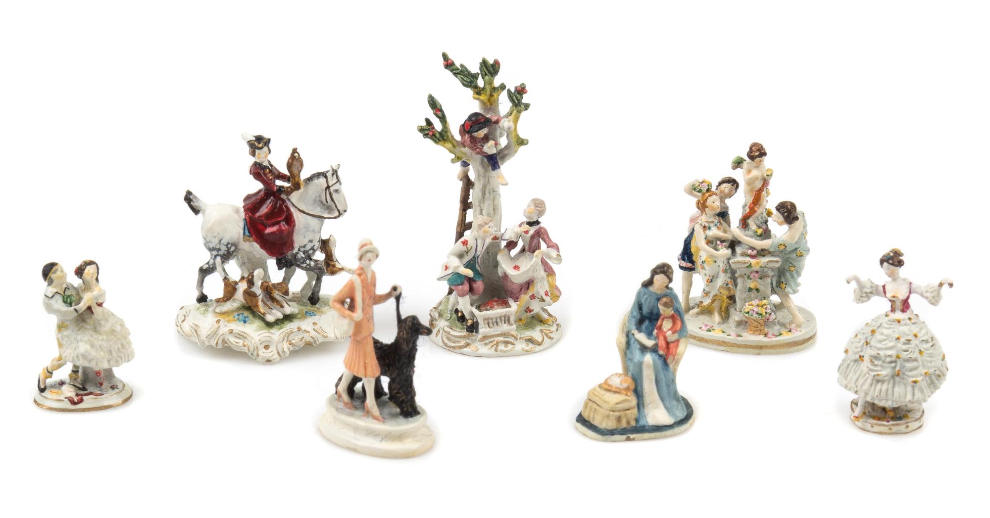 A Group of Seven Polychrome Painted Bronze Figural Groups Height of tallest 1 3/8 inches. — Robert Olszewski for Goebel Miniatures