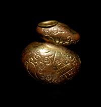 A Silver and Bronze Pouch-Form Ojime