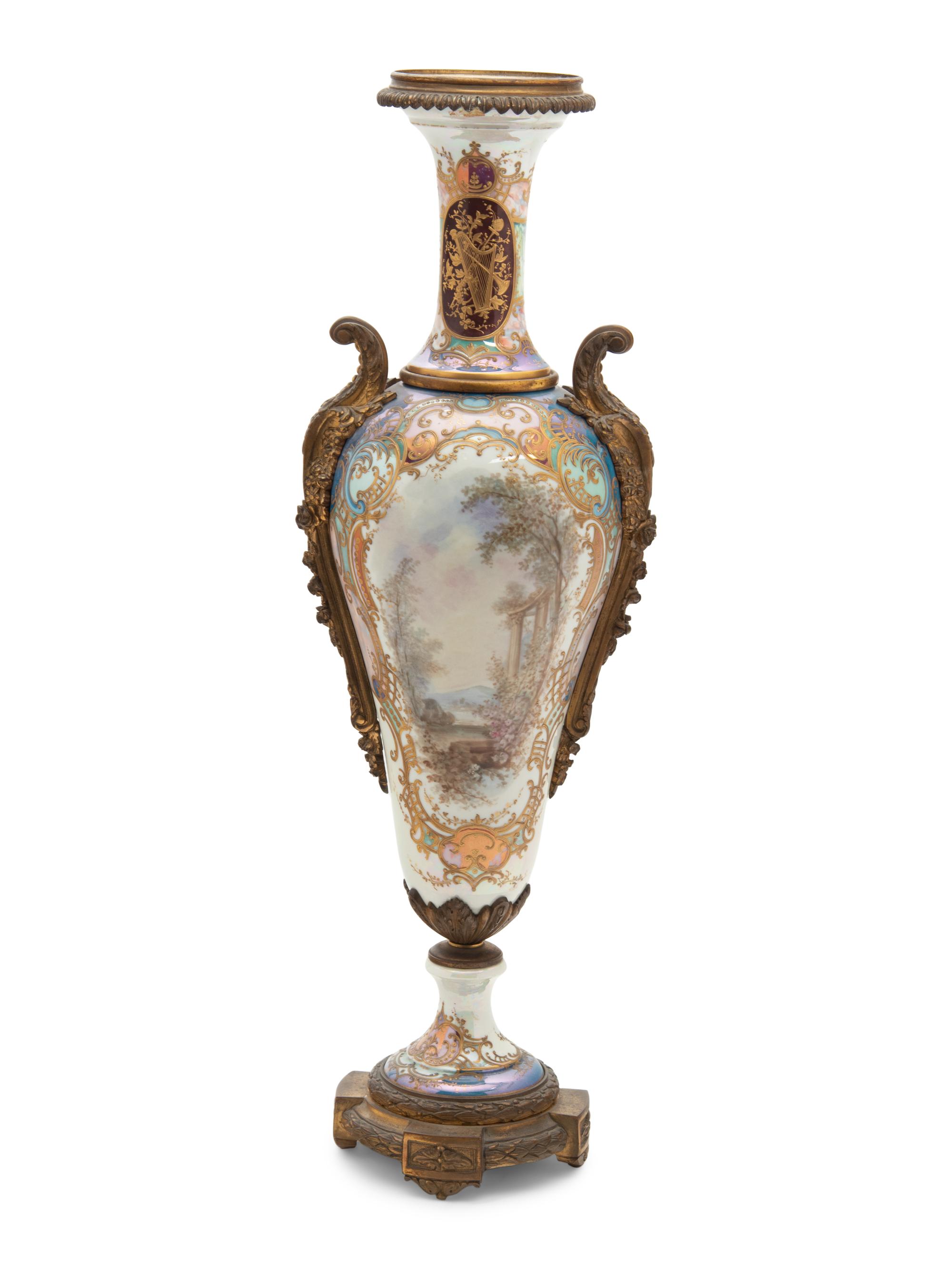 A Sèvres Style Gilt Bronze Mounted Porcelain Urn