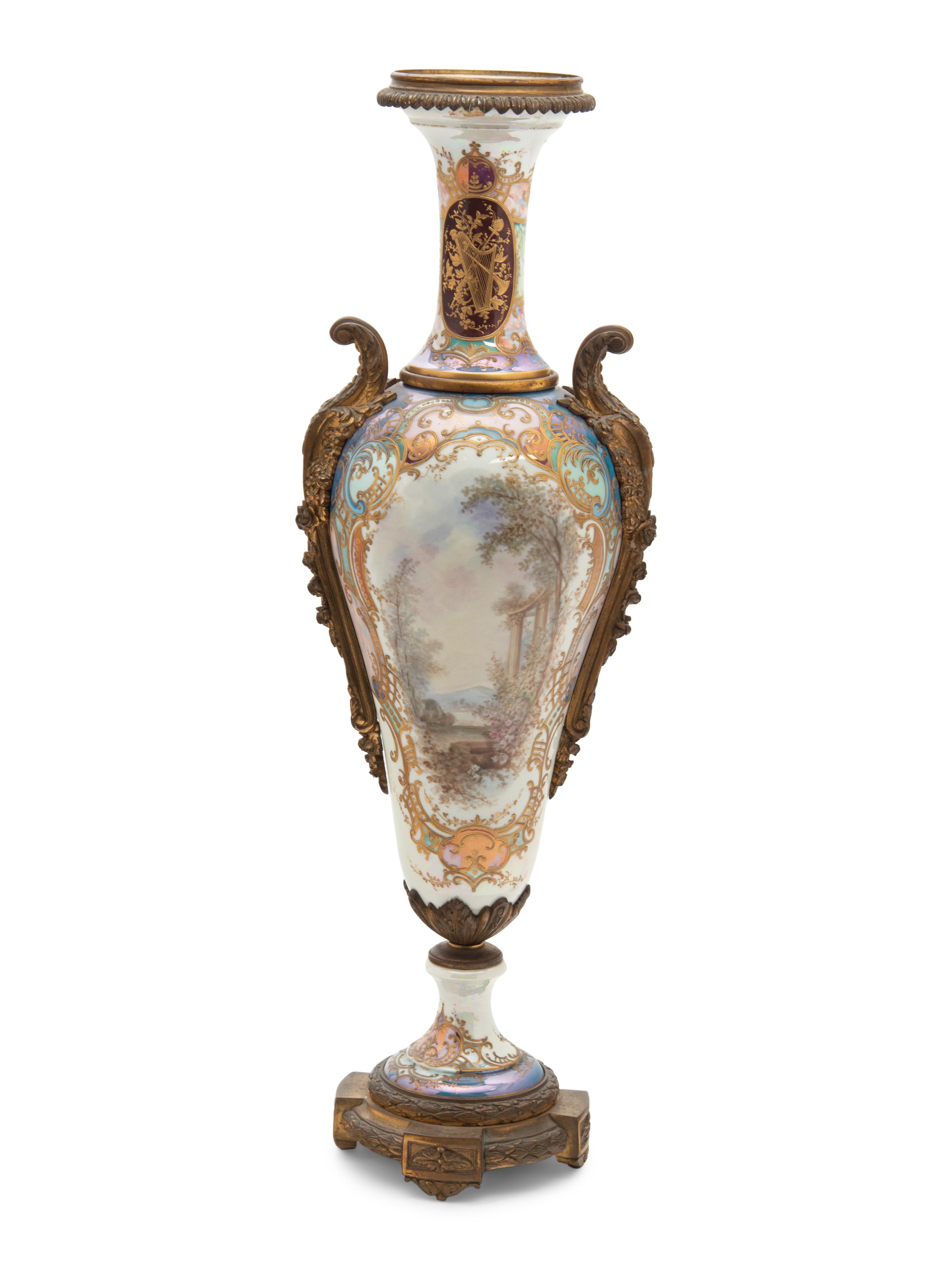 A Sèvres Style Gilt Bronze Mounted Porcelain Urn
