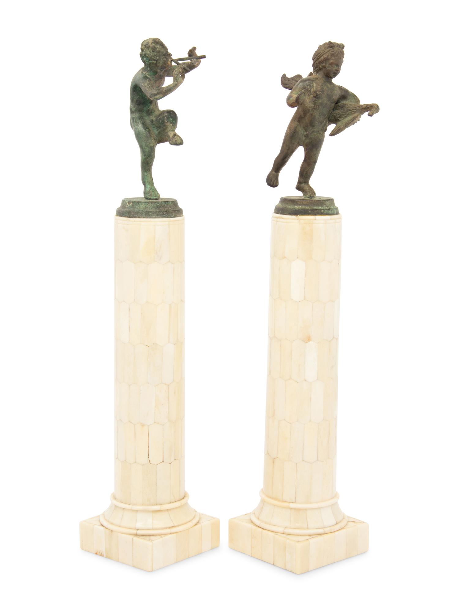 A Matched Pair of Bronze Figures on Resin Veneered Columns
