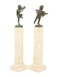 A Matched Pair of Bronze Figures on Resin Veneered Columns