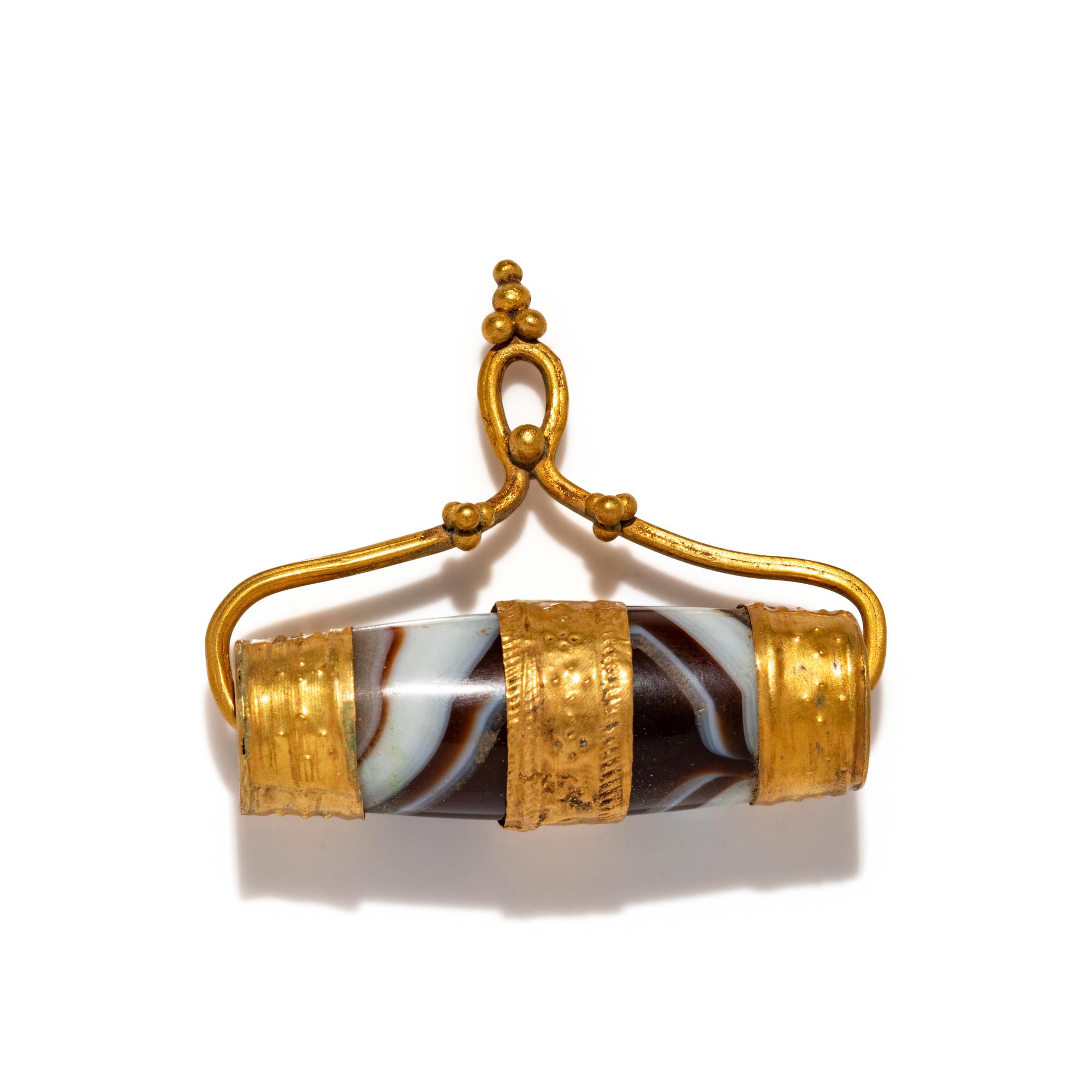 A Western Asiatic Gold and Banded-Agate Pendant — Set in a gold pendant