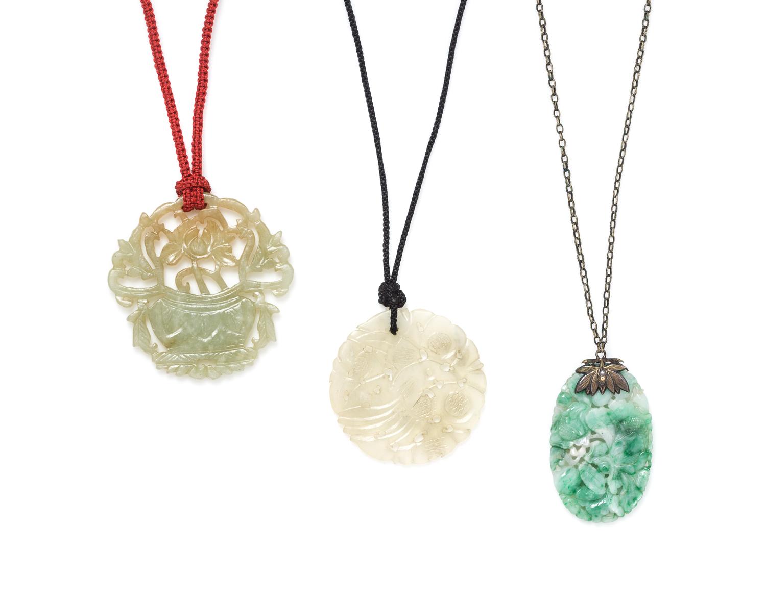 Three Jadeite Pendants Diameter of largest 2 1/4 inches.