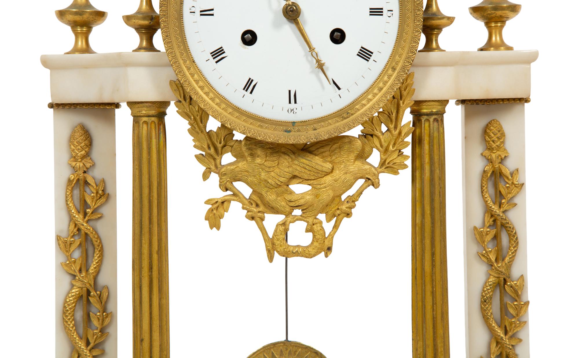 A French Gilt Bronze and White Marble Mantel Clock