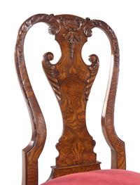 A Set of Twelve Baker George II Style Dining Chairs