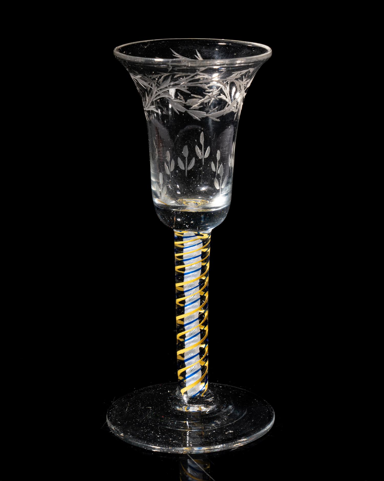 A Rare Canary-Yellow and Blue Color Twist Engraved Wine Glass