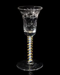 A Rare Canary-Yellow and Blue Color Twist Engraved Wine Glass