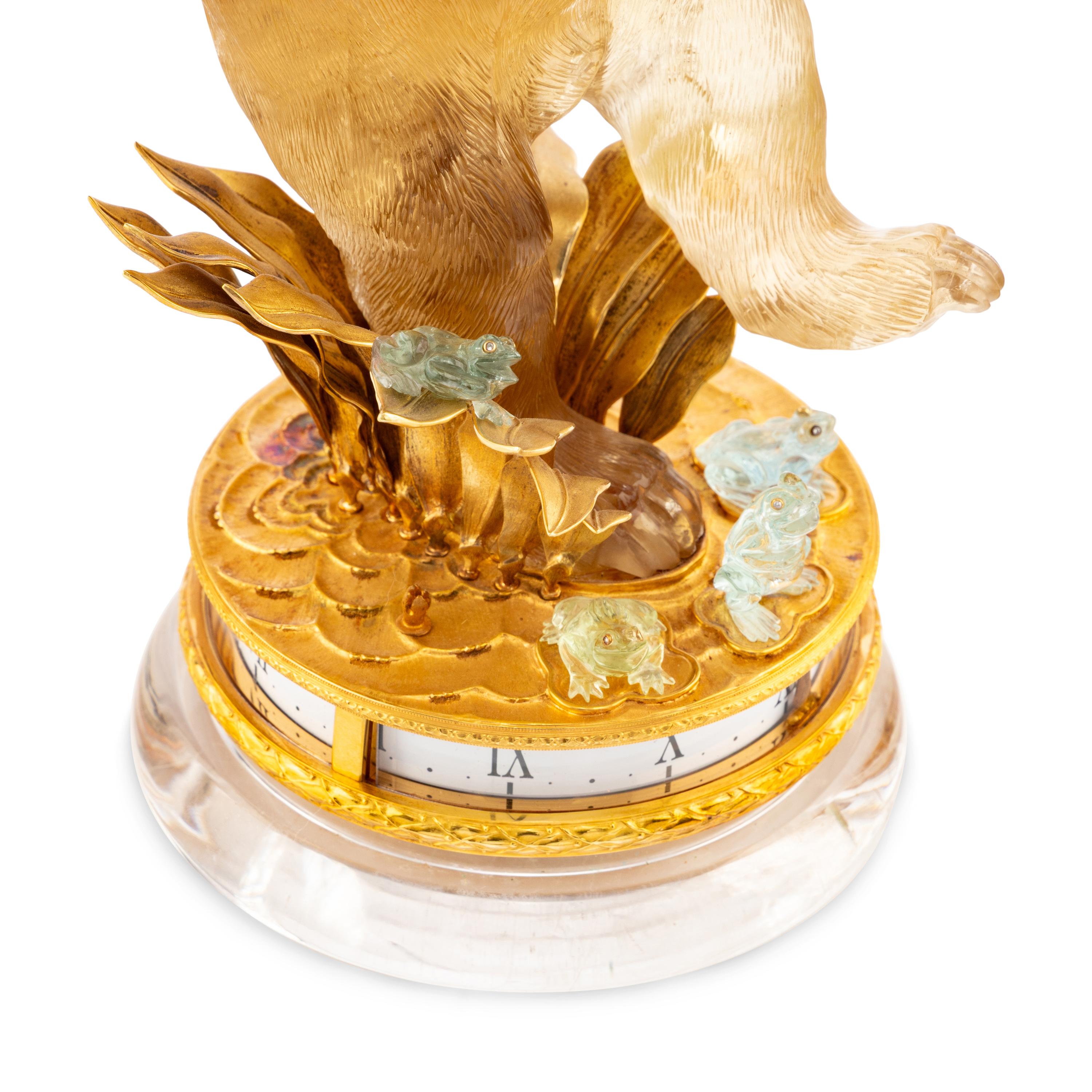 An 18-Karat Yellow Gold, Carved Citrine, Hardstone and Diamond-Inset Annular Clock