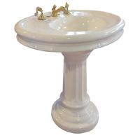 A Porcelain Pedestal Sink with Aquatic Hardware 37.5" W x 27.5" D x 32" H — United States, 20th Century