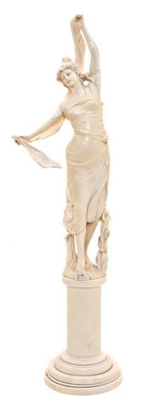 A Continental Art Nouveau Carved Ivory Figure, Height overall 18 1/4 inches.