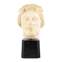 A Continental Carved Marble Head of a Woman