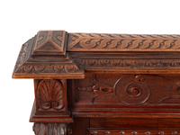 A Pair of Italian Carved Walnut Panels with Marble Profile Plaques