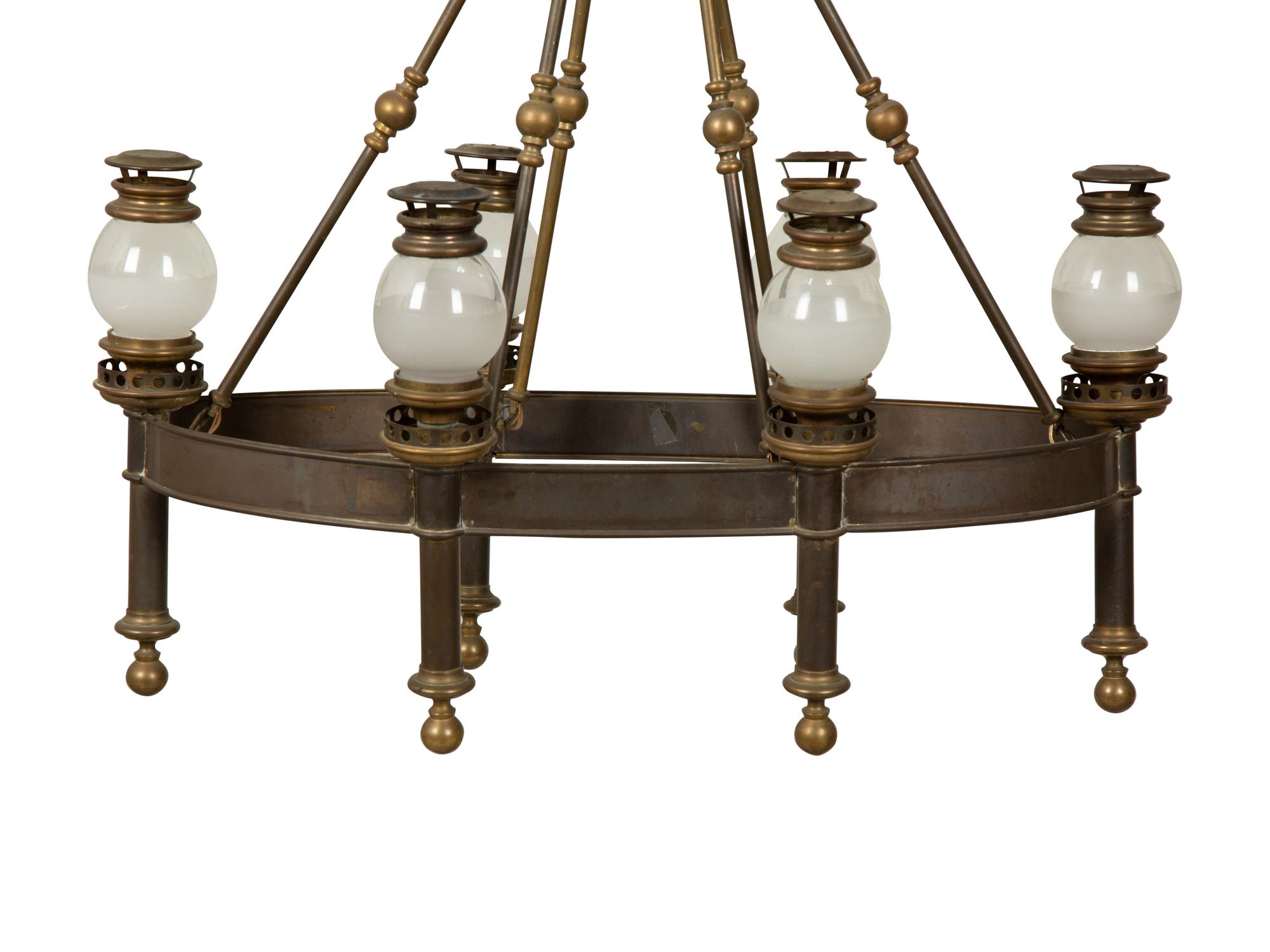 A Chapman Brass Six-Light Chandelier with Glass Shades