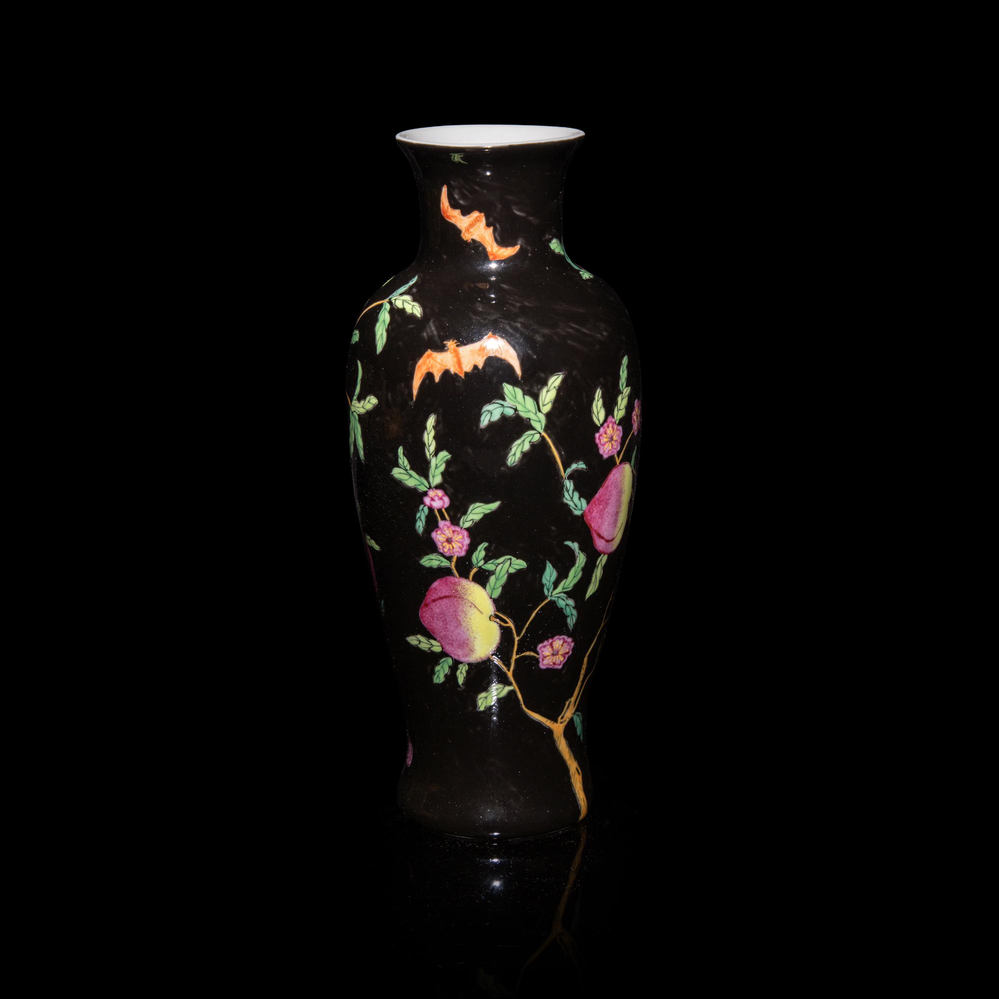 A Chinese Black Ground Famille Rose Porcelain 'Bat and Peach' Vase, 20th Century — 近代 黑地福桃紋觀音瓶