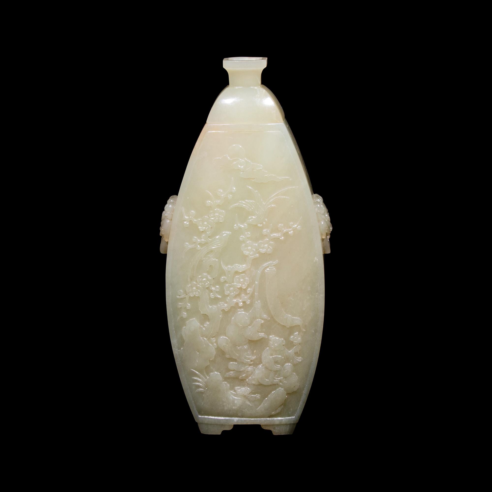 A Chinese Celadon Jade Vase and Cover, Late 19th Century 清晚期 青白玉浮雕童戲圖蓋瓶