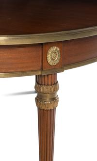 A Louis XVI Style Gilt Bronze Mounted Mahogany Dining Table