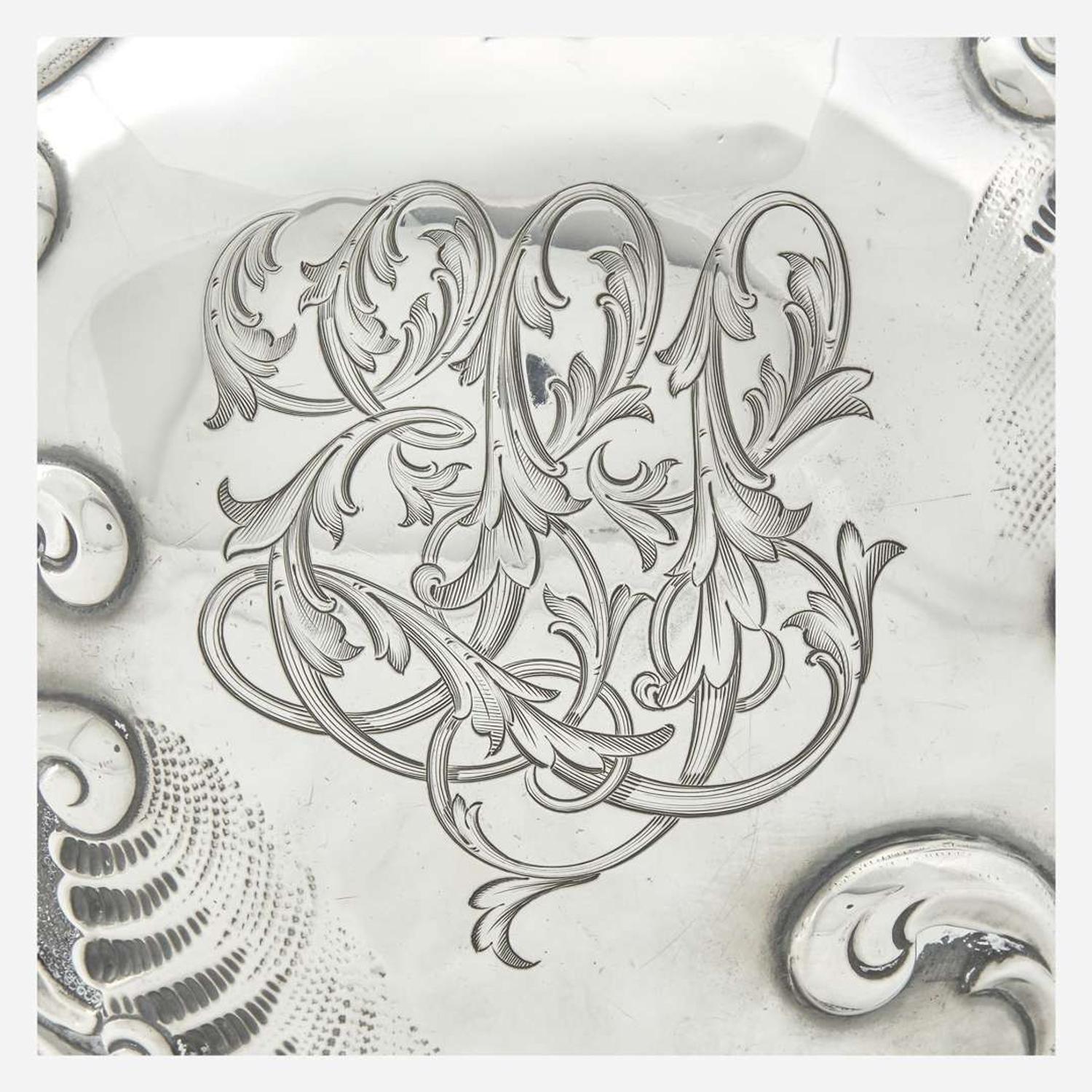 A sterling silver repoussé water pitcher Retailed by Bailey Banks & Biddle, Philadelphia, PA, late 19th century