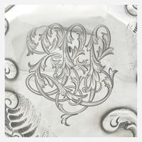 A sterling silver repoussé water pitcher Retailed by Bailey Banks & Biddle, Philadelphia, PA, late 19th century