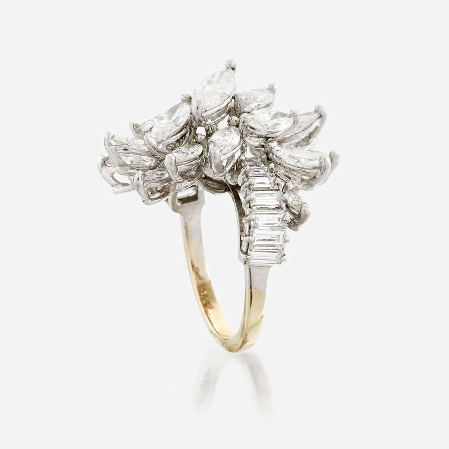 A diamond, platinum, and white metal ring