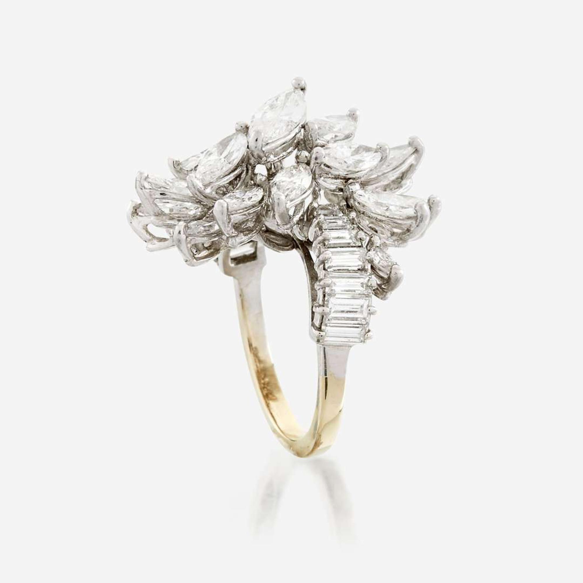 A diamond, platinum, and white metal ring