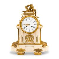 A Louis XVI Style Gilt Bronze Mounted Marble Mantel Clock