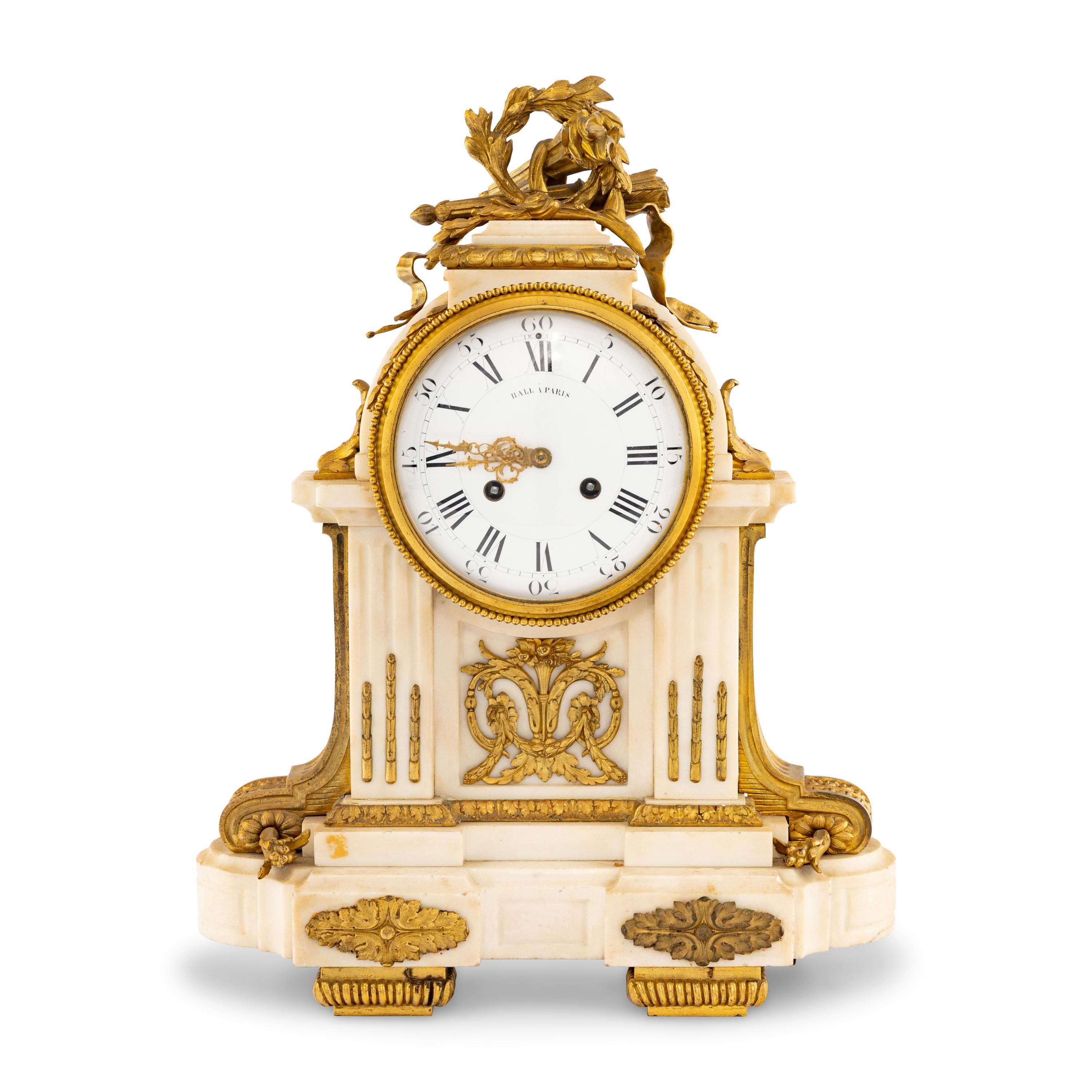 A Louis XVI Style Gilt Bronze Mounted Marble Mantel Clock