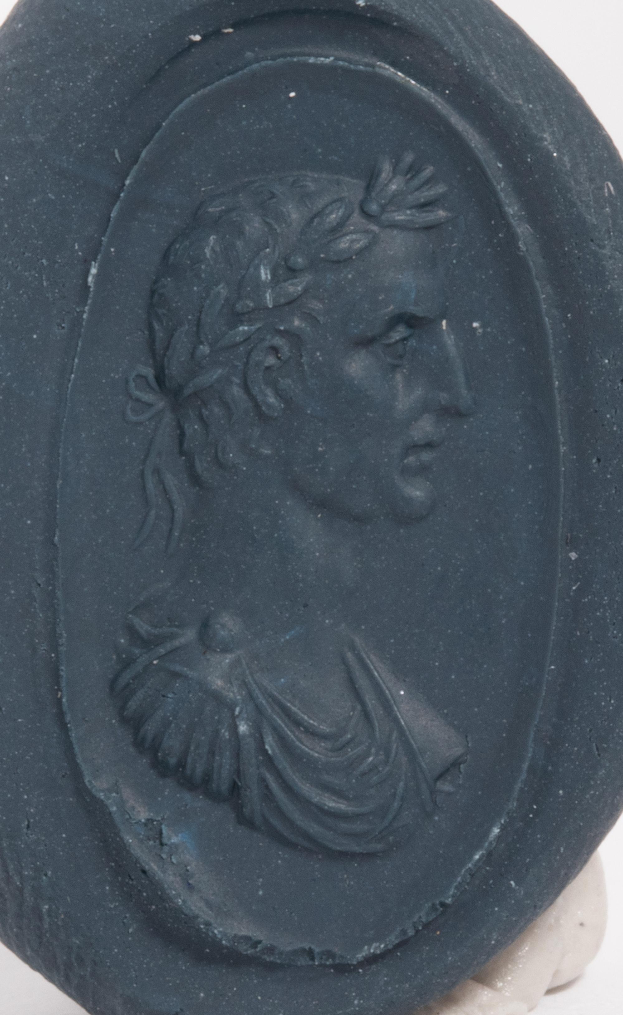 A Neoclassical Carnelian and Gold Finger Ring with a Portrait Bust of the Roman Emperor Augustus