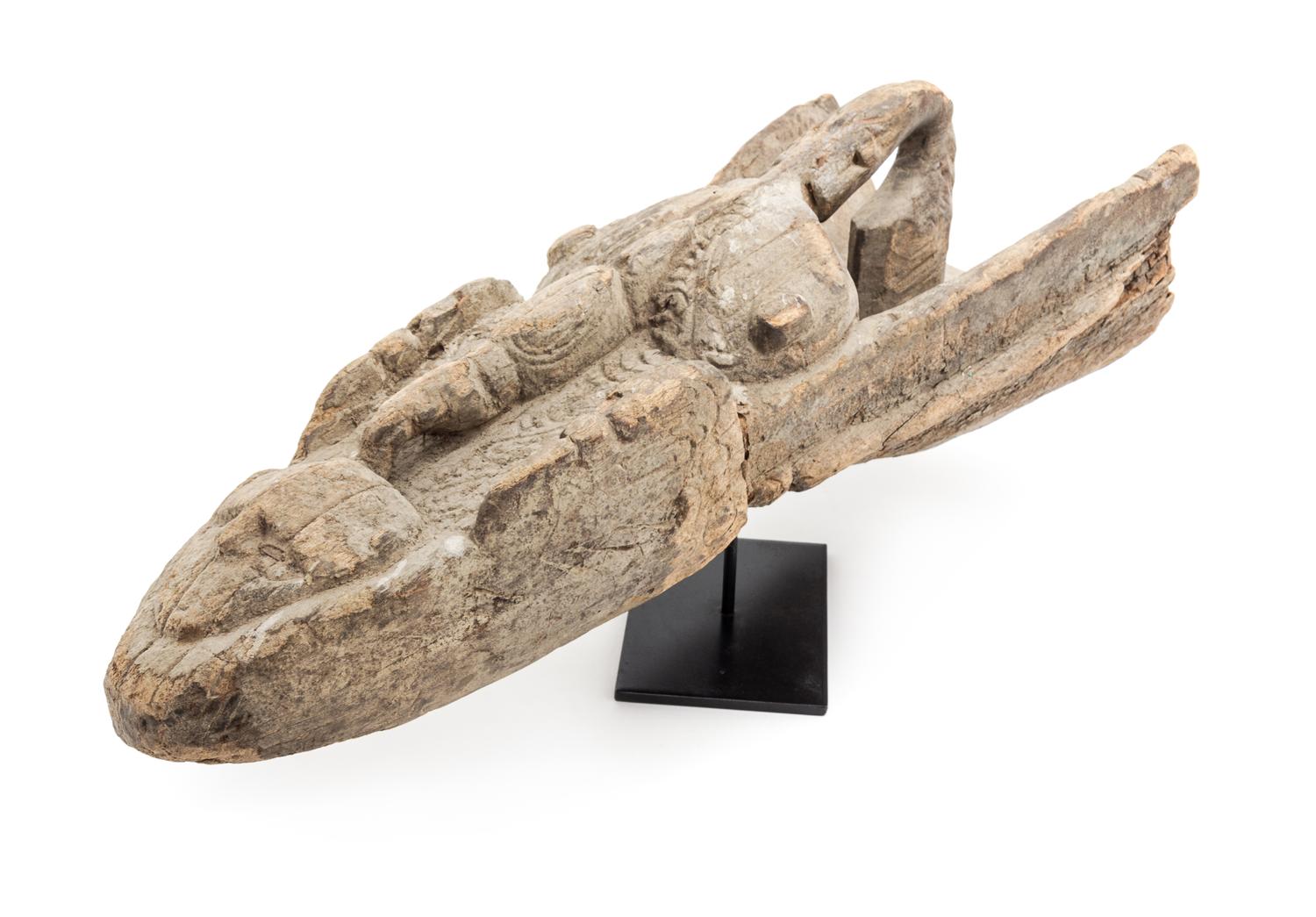 An Oceanic, Sepik River Canoe Prow from Papua New Guinea. Length 23 1/4 x width 10 1/4 x depth 6 1/2 inches.