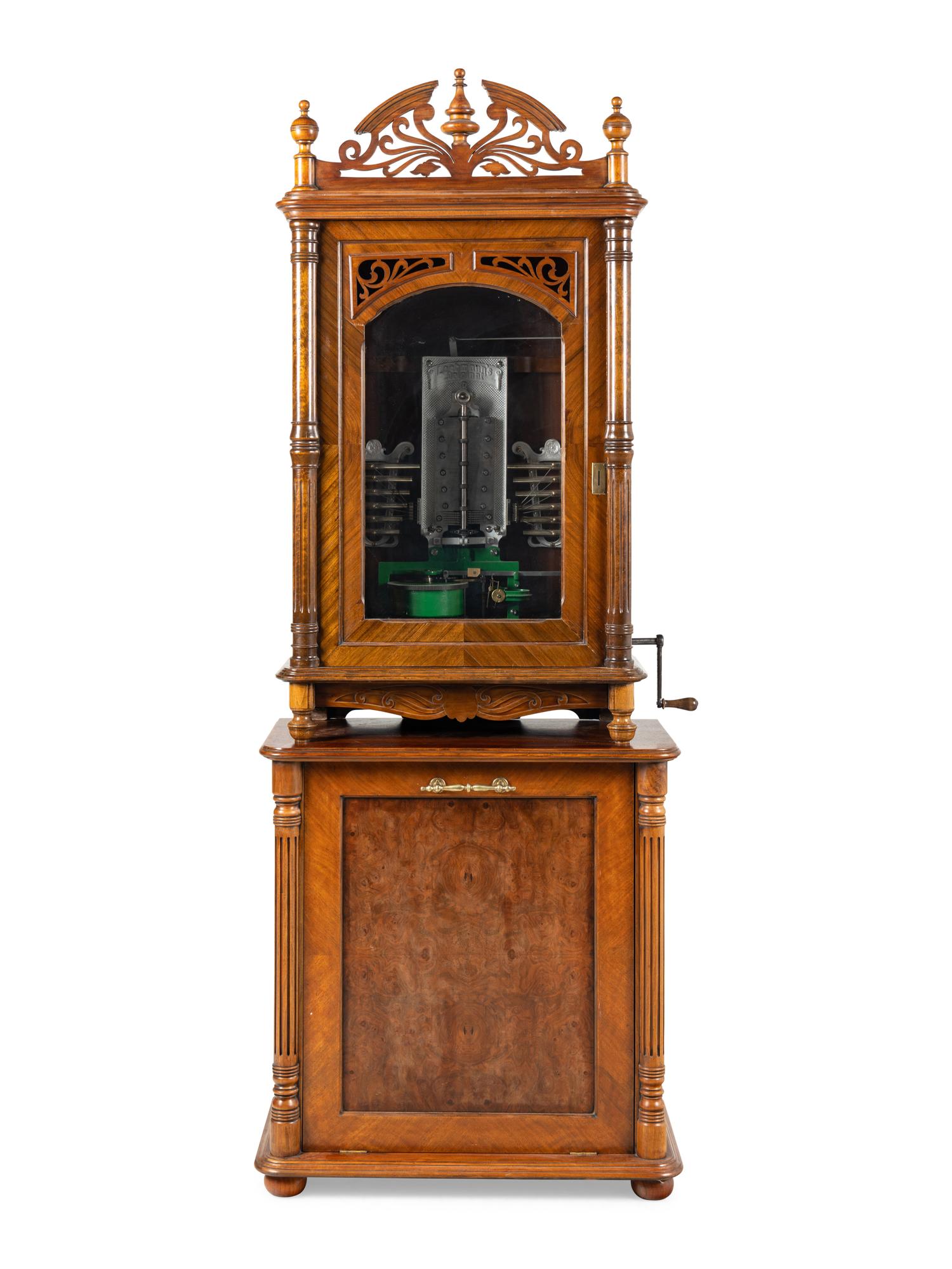 A 24-Inch Lochmann's Original Disc Music Box with Tubular Bells and Base Cabinet