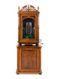 A 24-Inch Lochmann's Original Disc Music Box with Tubular Bells and Base Cabinet