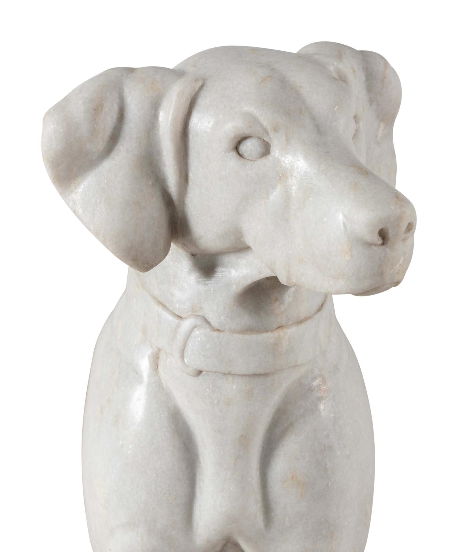 A Composition Marble Seated Dog