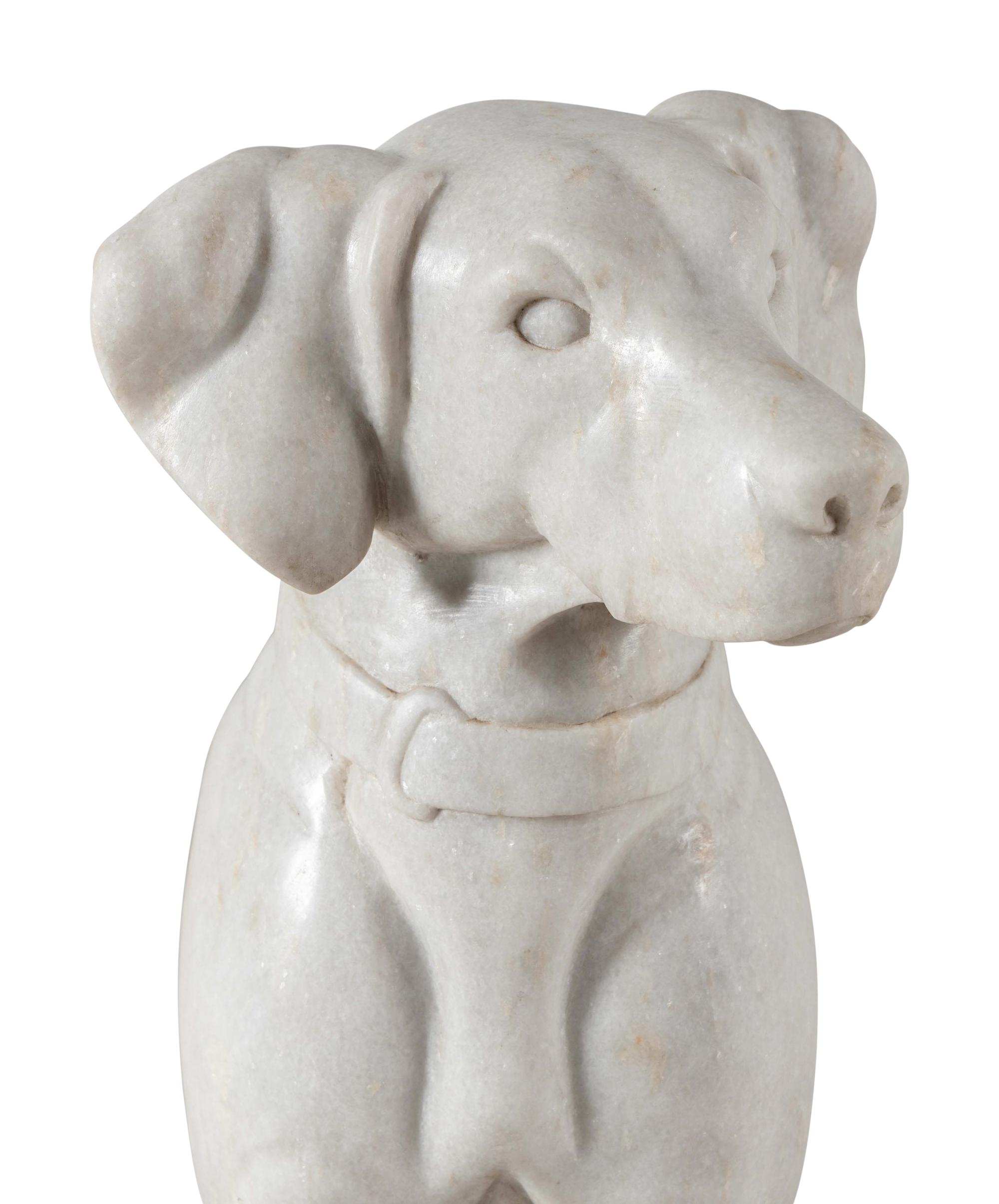 A Composition Marble Seated Dog