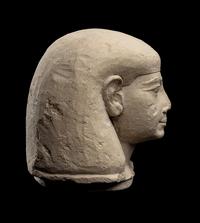 An Egyptian Limestone Canopic Jar Lid for Imseti