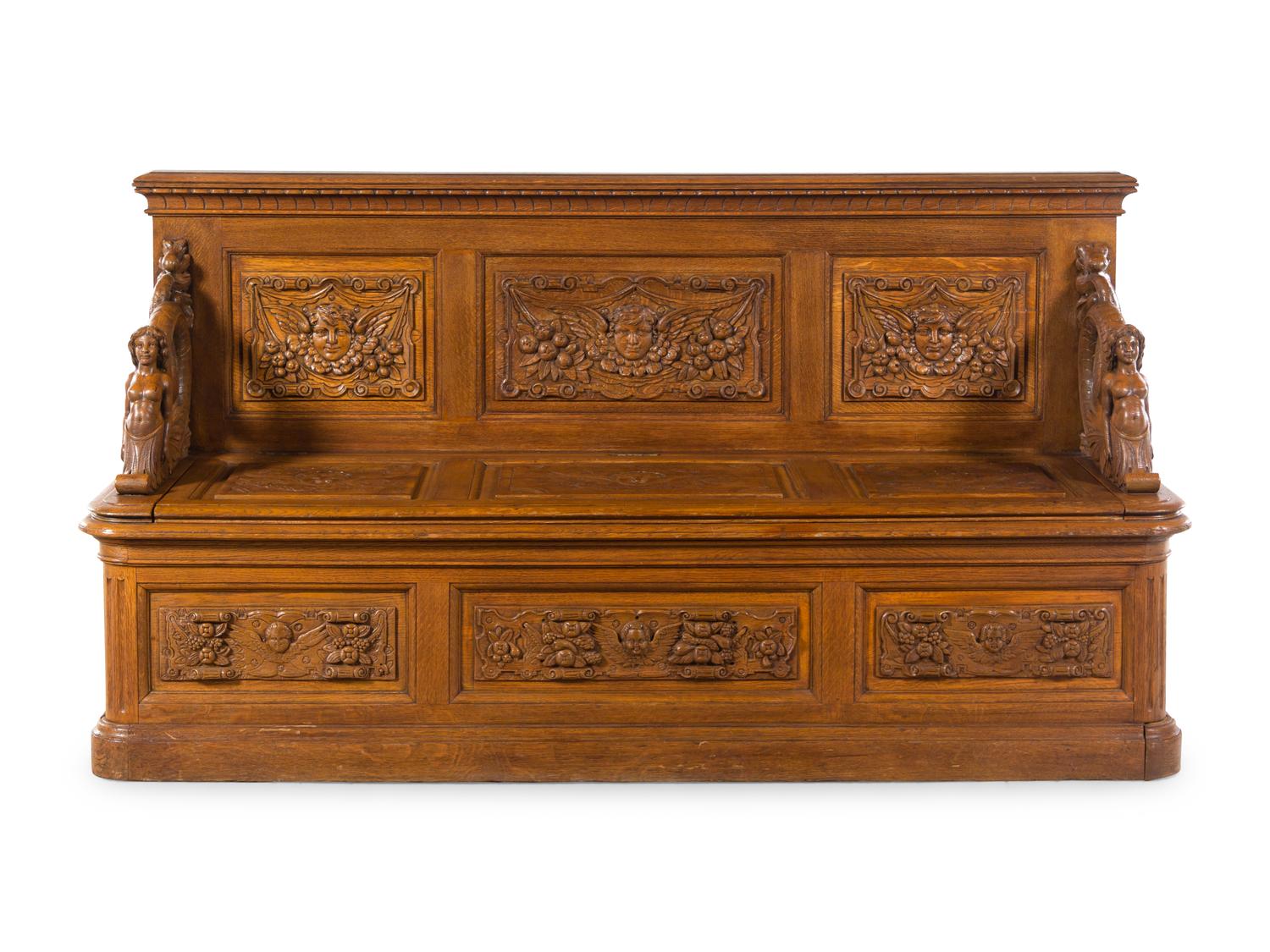 A Renaissance Revival Carved Walnut Hall Bench in the Manner of R.J. Horner