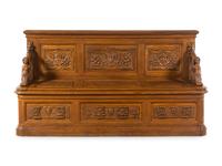 A Renaissance Revival Carved Walnut Hall Bench in the Manner of R.J. Horner