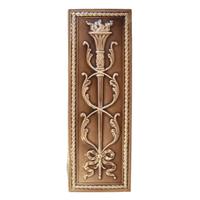 A Torch and Wreath Decorated Glazed Tile 6" W x 1" D x 18" H — United States, Early 20th Century