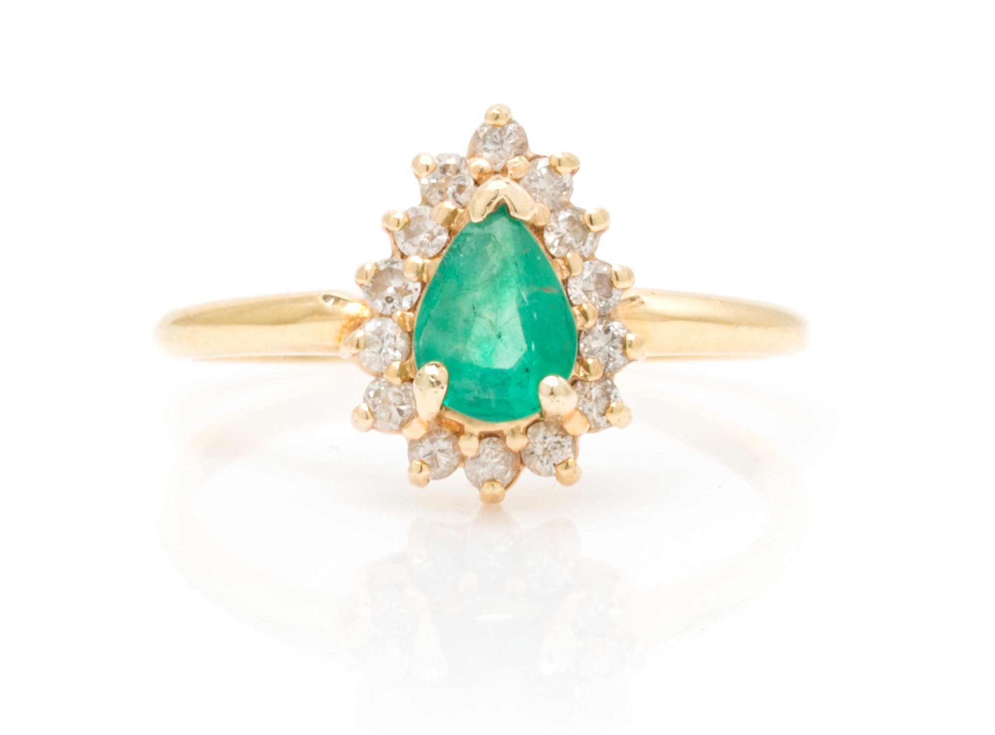 A 14 Karat Yellow Gold, Emerald and Diamond Ring, 1.80 dwts.