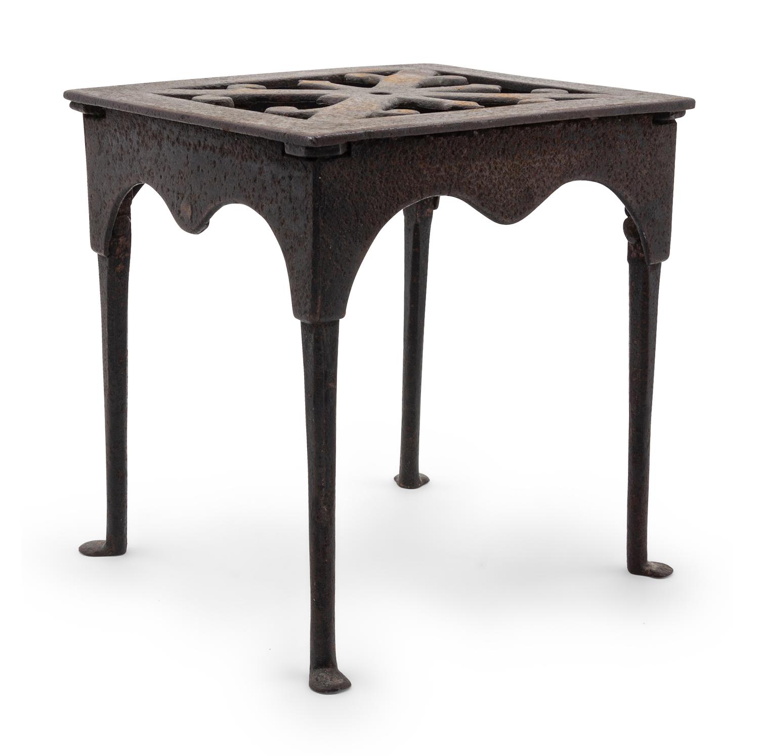A Wrought and Cast Iron Kettle Stand