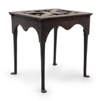 A Wrought and Cast Iron Kettle Stand