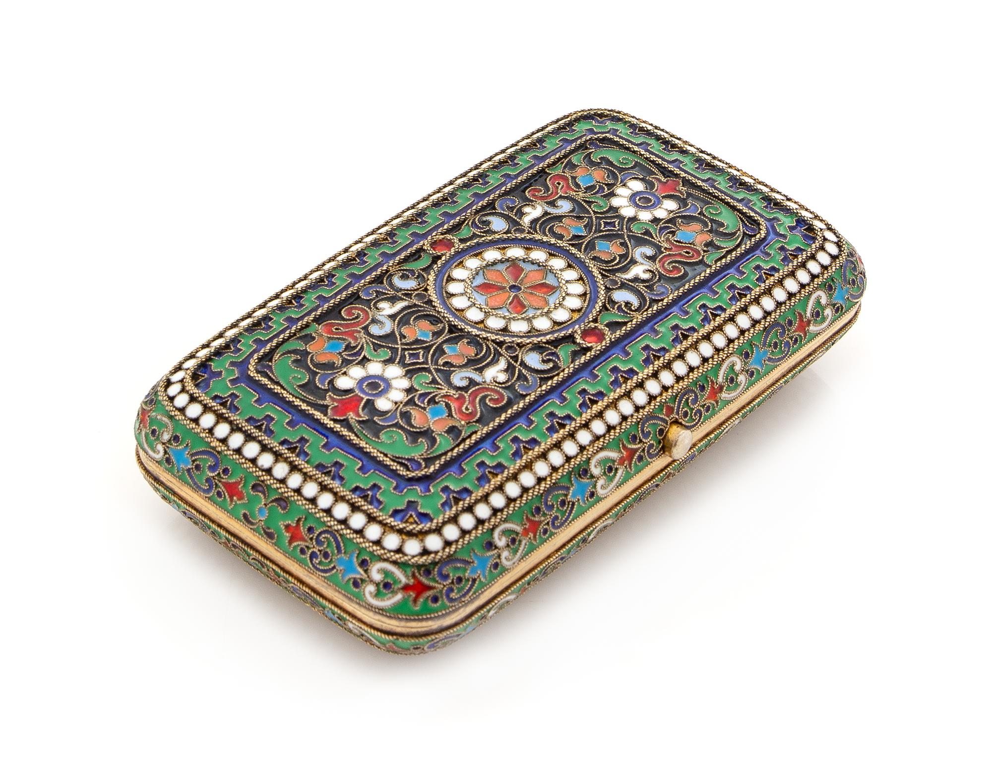 A Russian Enameled Silver Cigarette Case, Mark of Pavel Ovchinnikov with Imperial Warrant, Moscow, 1876, the lid centered with a polych