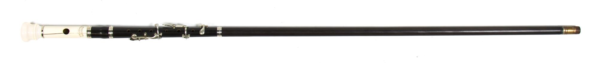 An Ebony and Ivory Flute Walking Stick, H.F. Meyer, Height overall 36 3/8 x length of flute 12 1/2 inches.