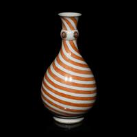 A Chinese Export Porcelain Iron Red Decorated 'Swirl' Bottle Vase, Kangxi Period 清康熙 外銷礬紅彩旋紋賞瓶