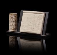 An Egyptian Glazed Steatite Cylinder Seal Height 1 inch. — POSSIBLY MIDDLE KINGDOM, DYNASTY 11-14, 2040-1640 B.C.E.