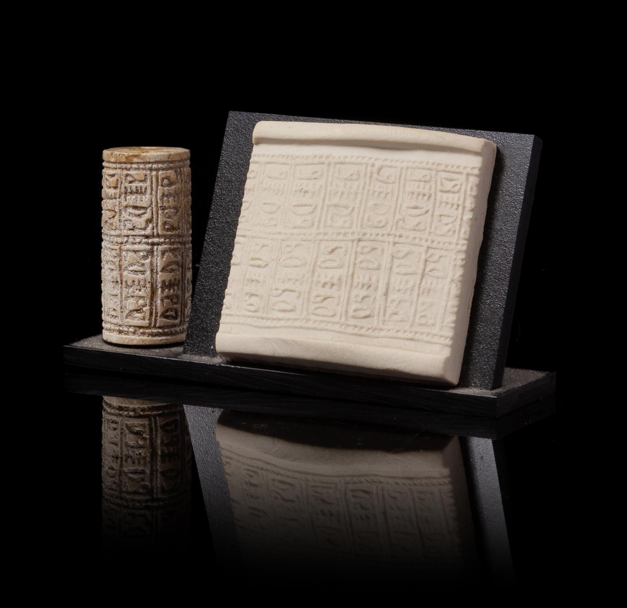 An Egyptian Glazed Steatite Cylinder Seal Height 1 inch. — POSSIBLY MIDDLE KINGDOM, DYNASTY 11-14, 2040-1640 B.C.E.