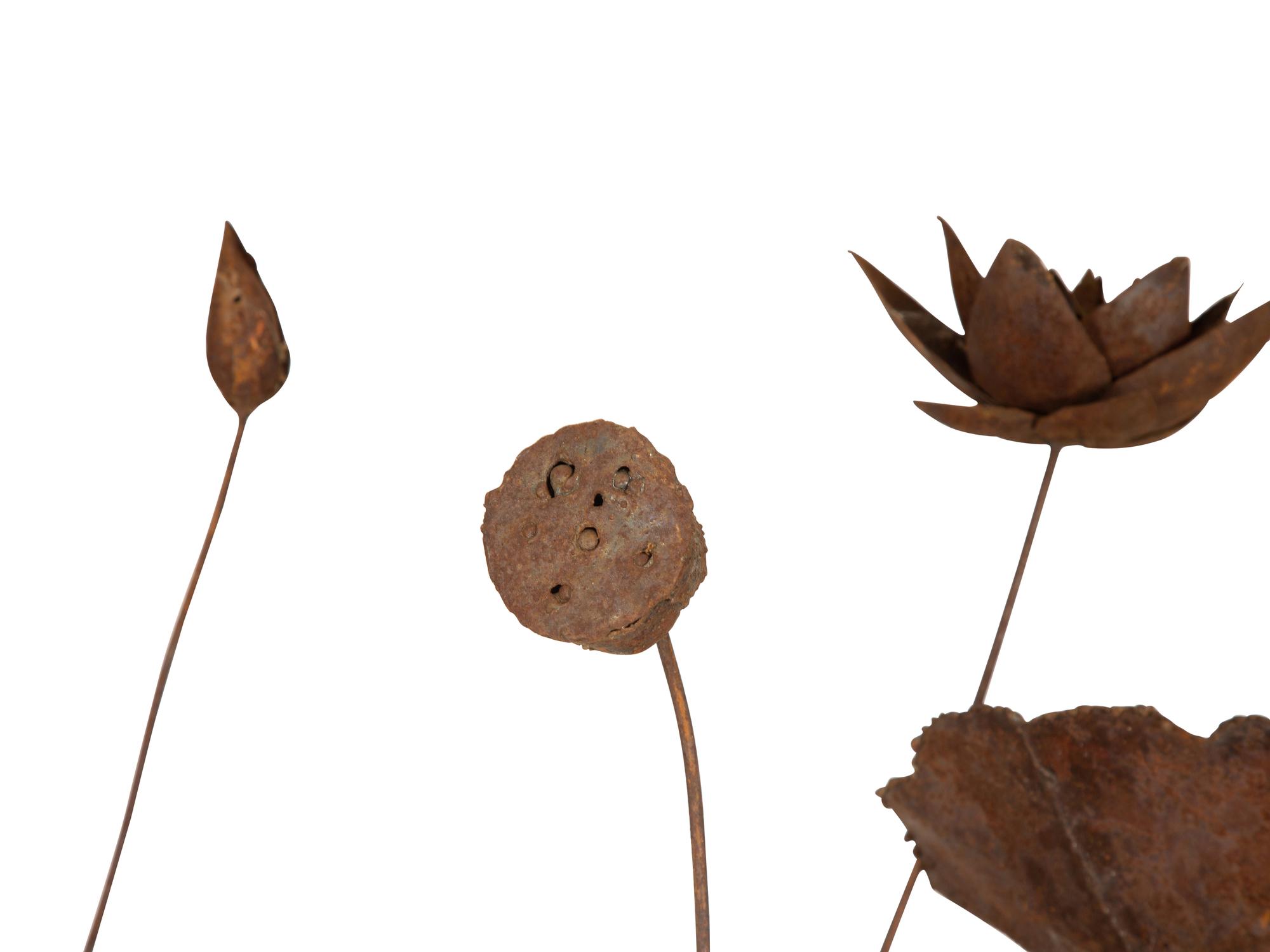 A Metal Multi-Headed Water Lily Sculpture