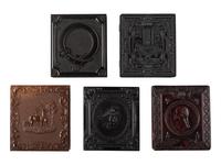 [EARLY PHOTOGRAPHY]. 10 figural and floral sixth plate Union cases containing portraits of men.