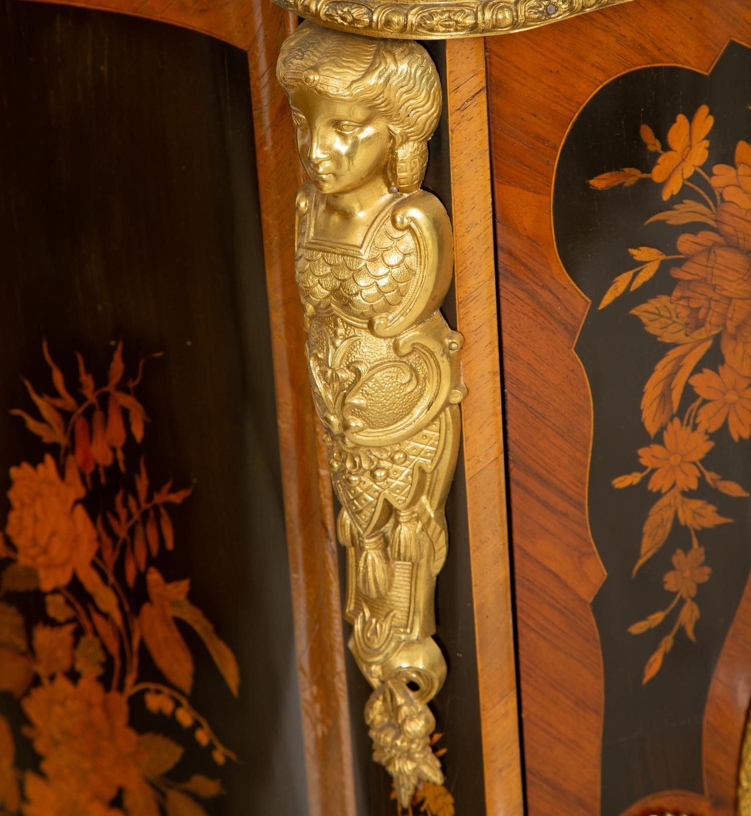 A Napoleon III Gilt Bronze Mounted Marquetry Marble-Top Serpentine Cabinet